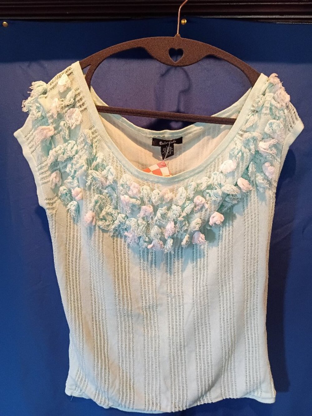 Vintage Aqua/blue color W/some white fringe type material @ top. Large